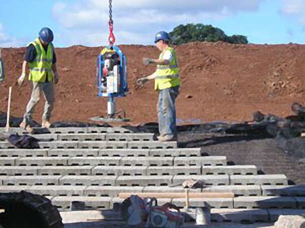 dam spillway concrete blocks - installing